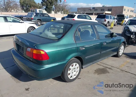 1999 Honda Civic Lx z USA, uszkodzony, nr VIN 2HGEJ6576XH563668